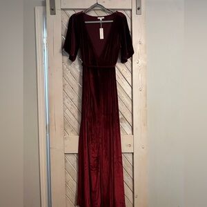 Wine red velvet dress. Never worn, still has tags.